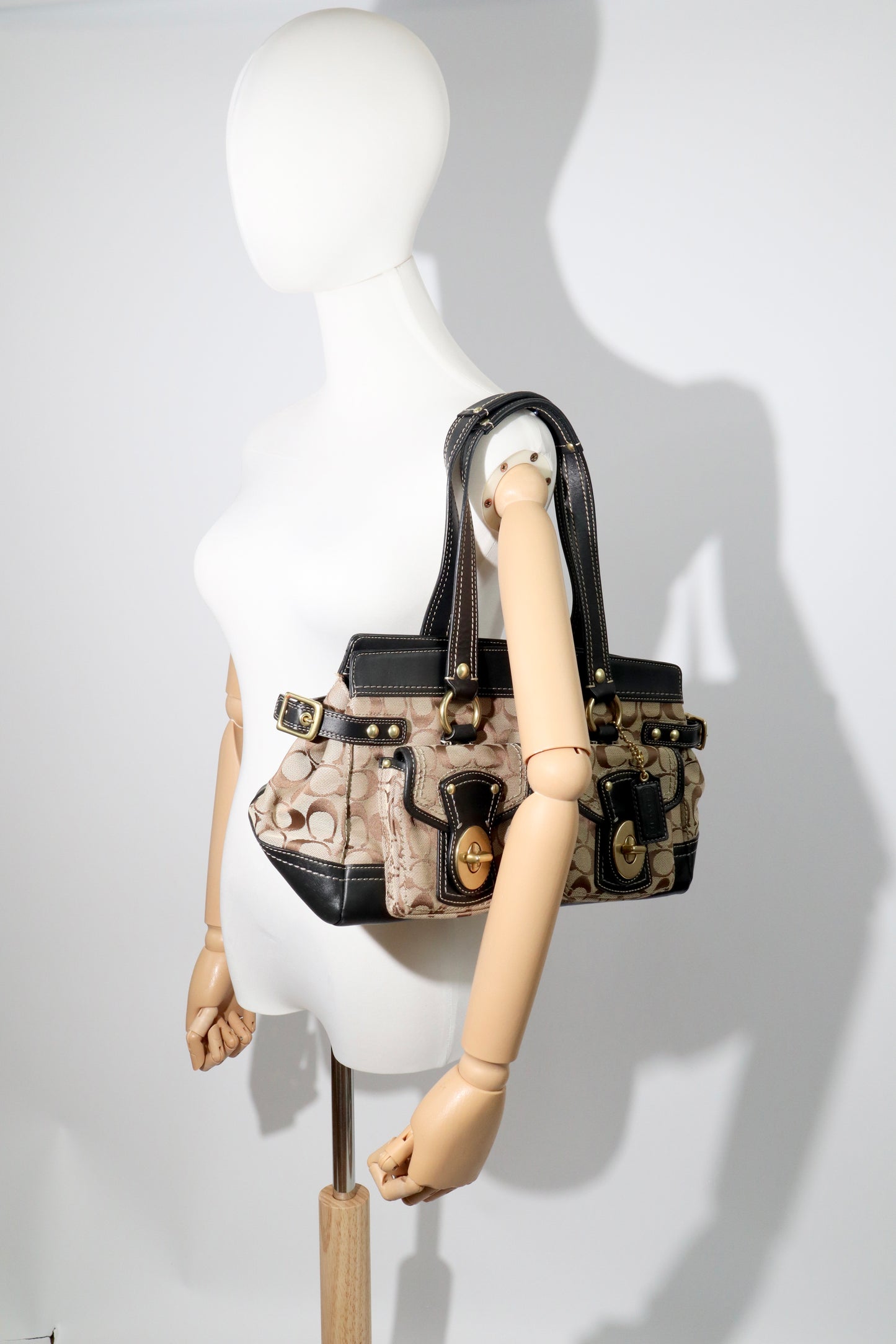 Coach Vintage 2002 Leather Satchel Gardenia handbag displayed on mannequin