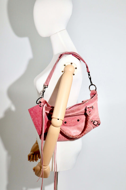 Balenciaga The First’ Pink Leather 2-Way Handbag worn by mannequin
