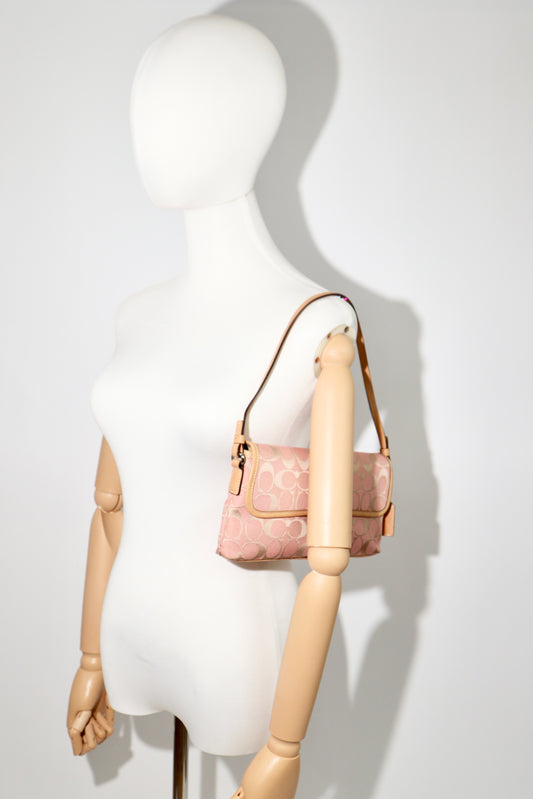 Vintage Coach 2002 Hampton Clip Demi Shoulder Bag in Peach worn by mannequin