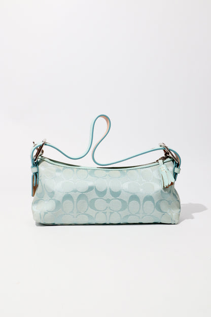 Coach Vintage 2004 Turquoise Demi Shoulder Bag standing upright showing the back