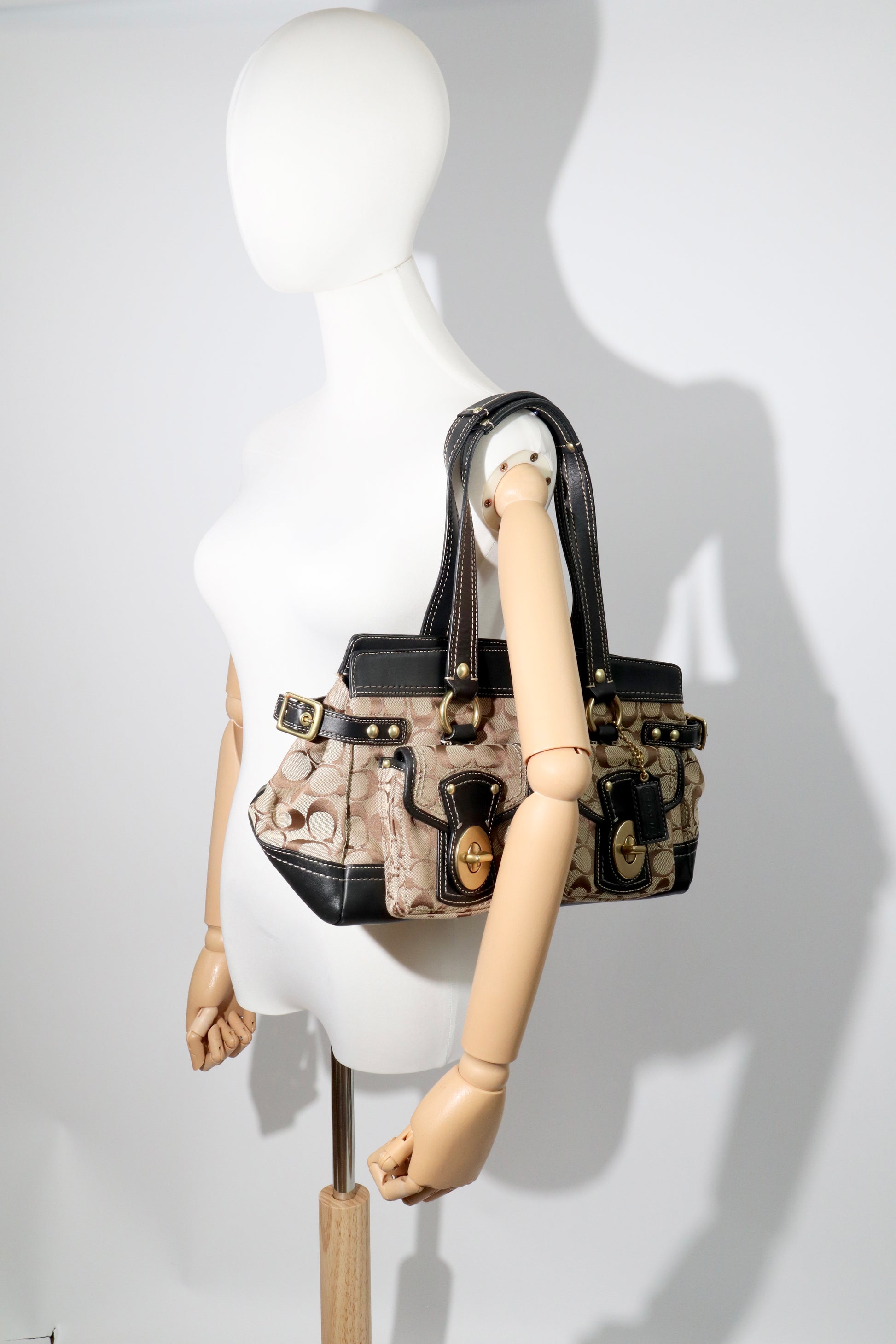 Coach Vintage 2002 Leather Satchel Gardenia handbag displayed on mannequin