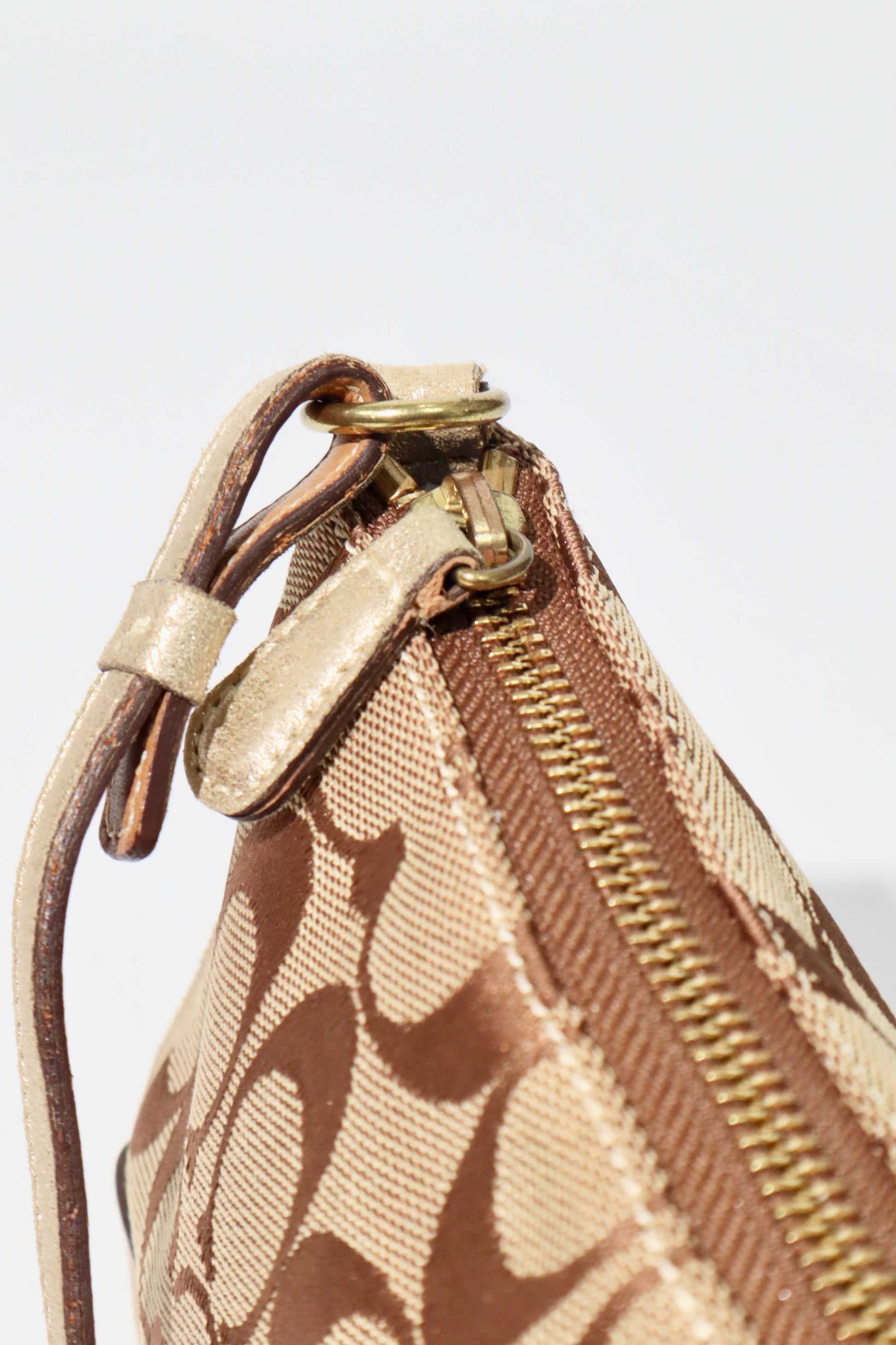 Coach Vintage 2005 Y2K Canvas Mini Pouch Brown & Gold detail of strap and canvas design