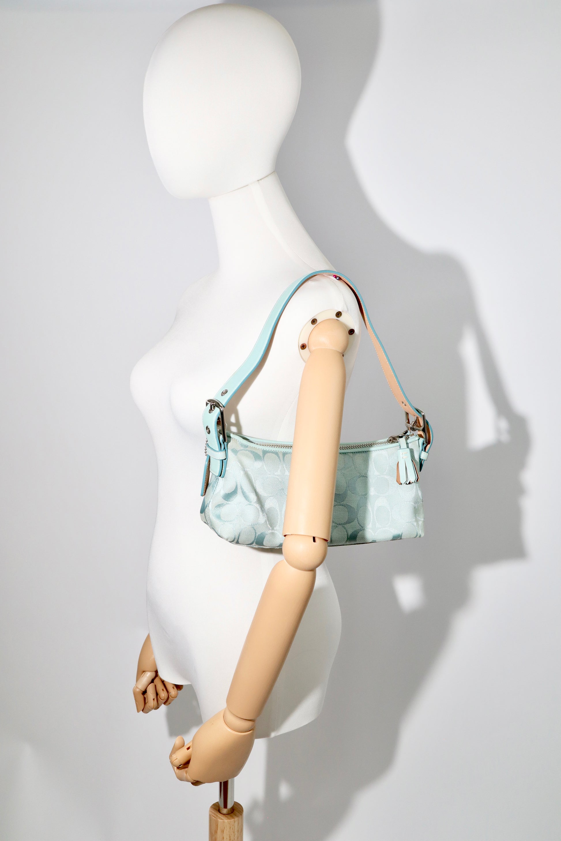 Coach Vintage 2004 Turquoise Demi Shoulder Bag displayed on mannequin to show size and fit