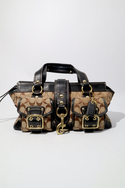 Coach Brown Signature 65th Anniversary Legacy Turnlock Rare Edition handbag with leather and canvas material