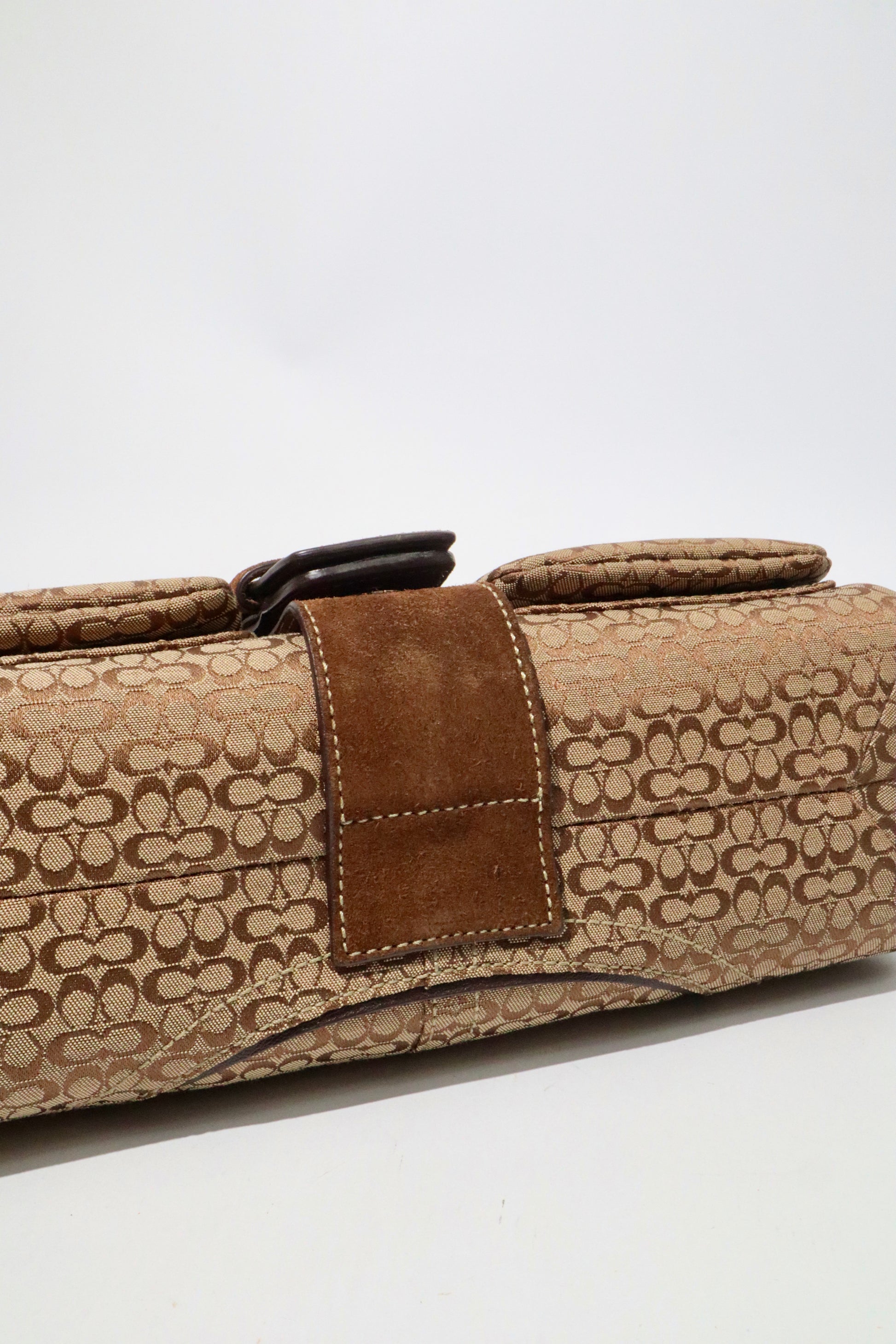 Bottom View of the Coach 2005 Vintage Soho Buckle Shoulder Bag in Brown Suedue 