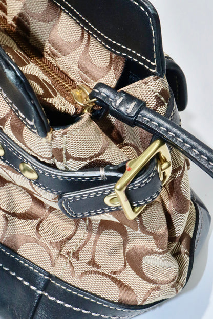 Coach Vintage 2002 Leather Satchel Gardenia handbag close-up of bronze hardware and canvas detail