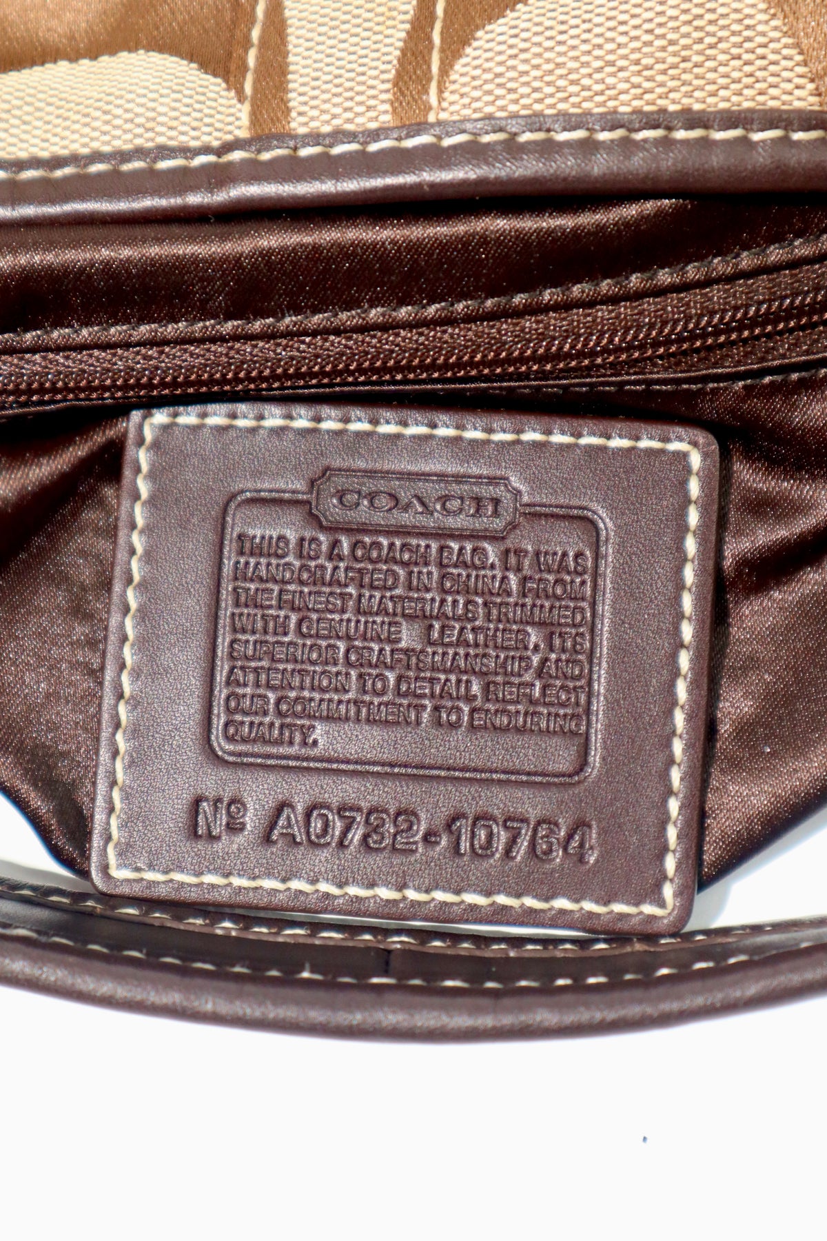 Coach Signature Ergo Hobo in Brown Monogram Canvas with Front Pocket