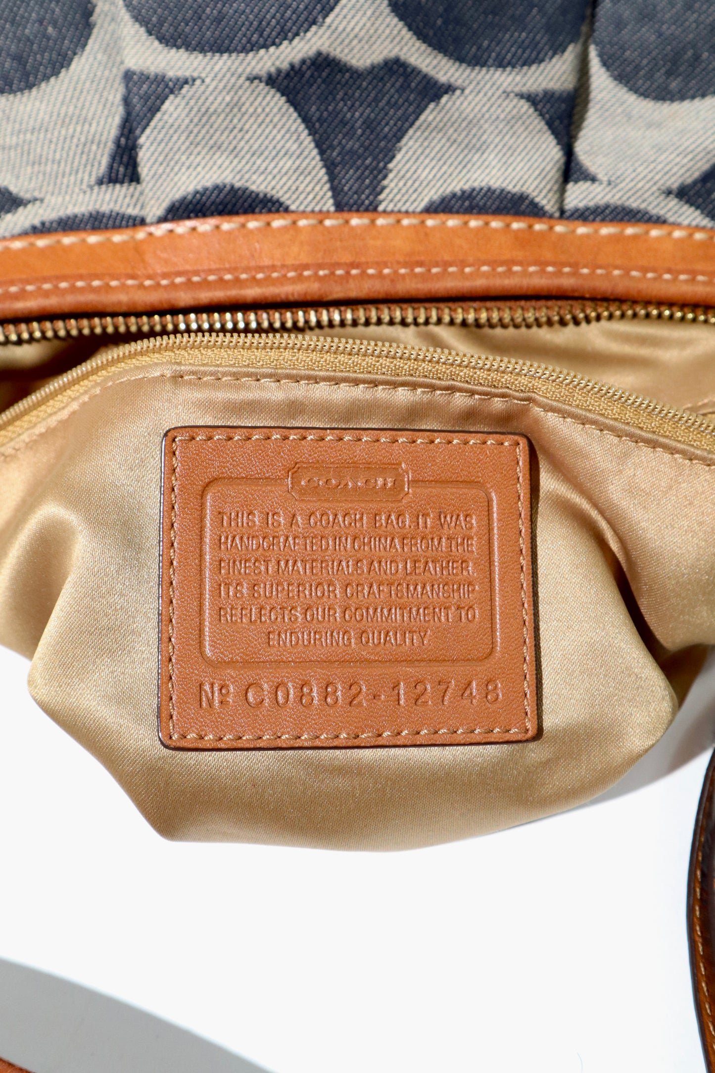 Coach Ergo aus Monogram Denim mit braunen Lederbesätzen – 12750