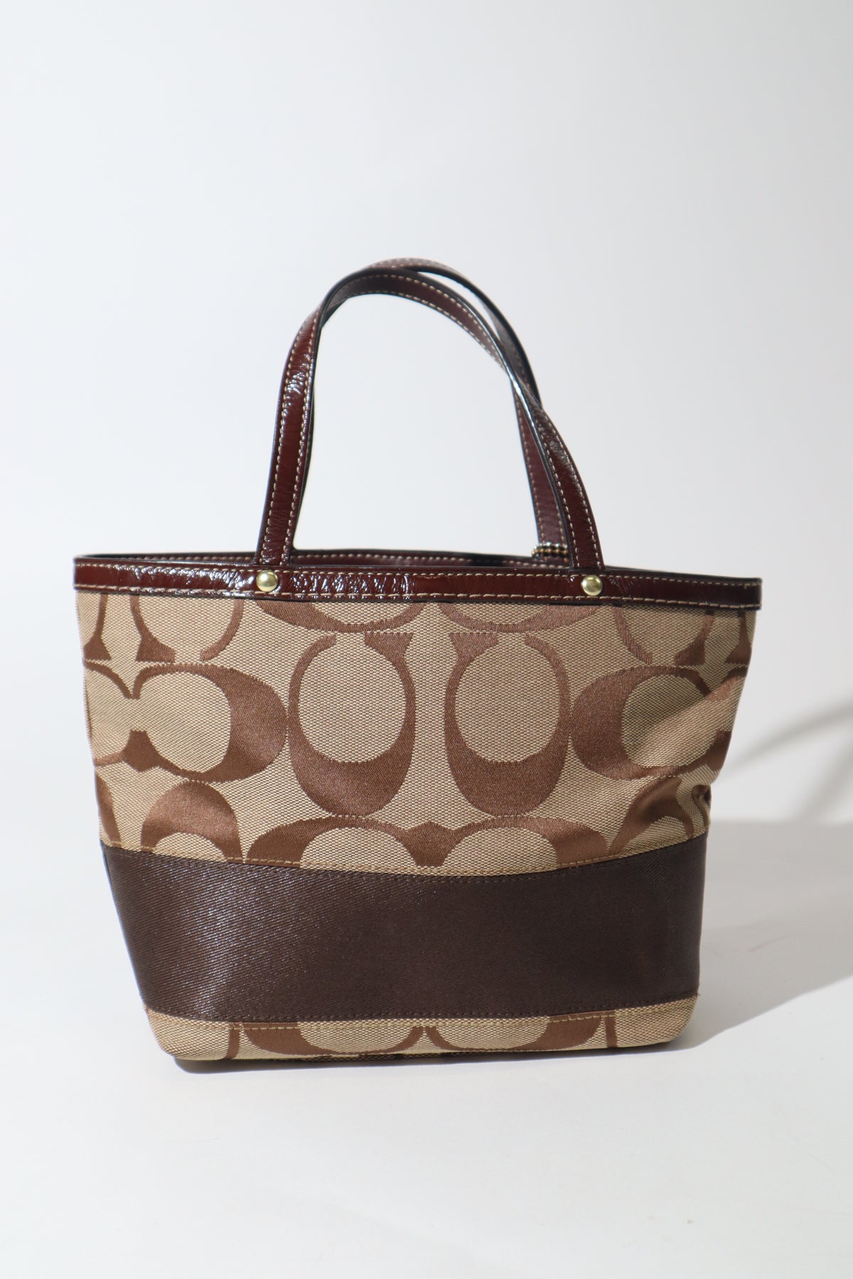 Coach Madeline Mini Tote in Braun mit goldfarbenem Drehverschluss – F12463