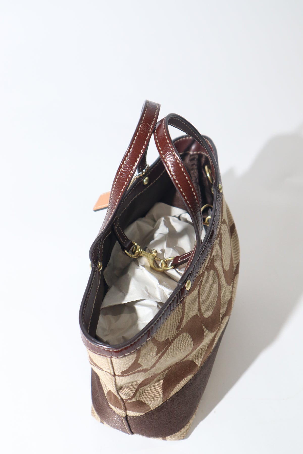 Coach Madeline Mini Tote in Braun mit goldfarbenem Drehverschluss – F12463