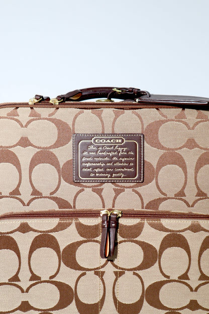 Coach Signature Canvas Rolling Carry-On Suitcase, model F77020