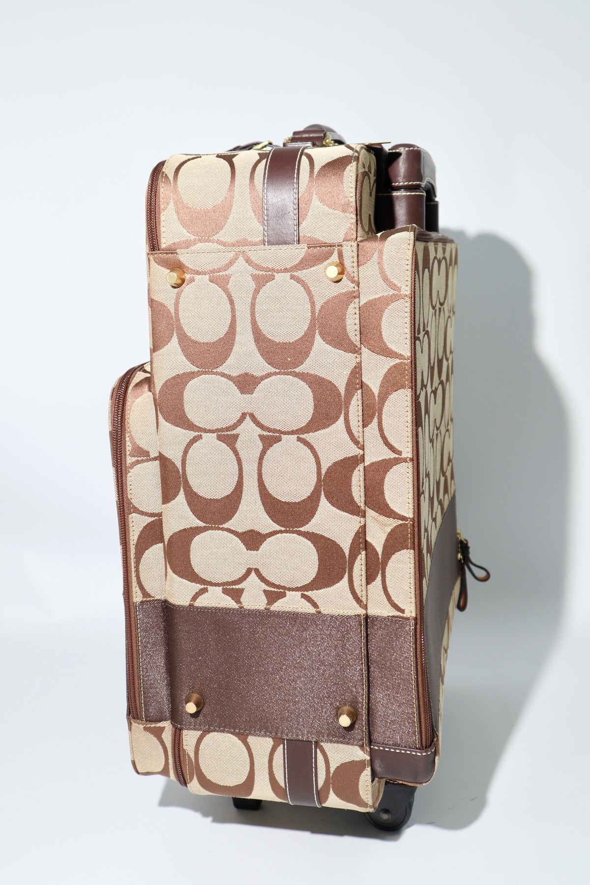 Coach Signature Canvas Rolling Carry-On Suitcase, model F77020