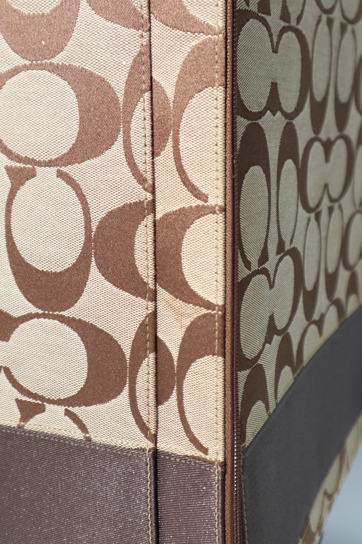 Coach Signature Canvas Rolling Carry-On Suitcase, model F77020