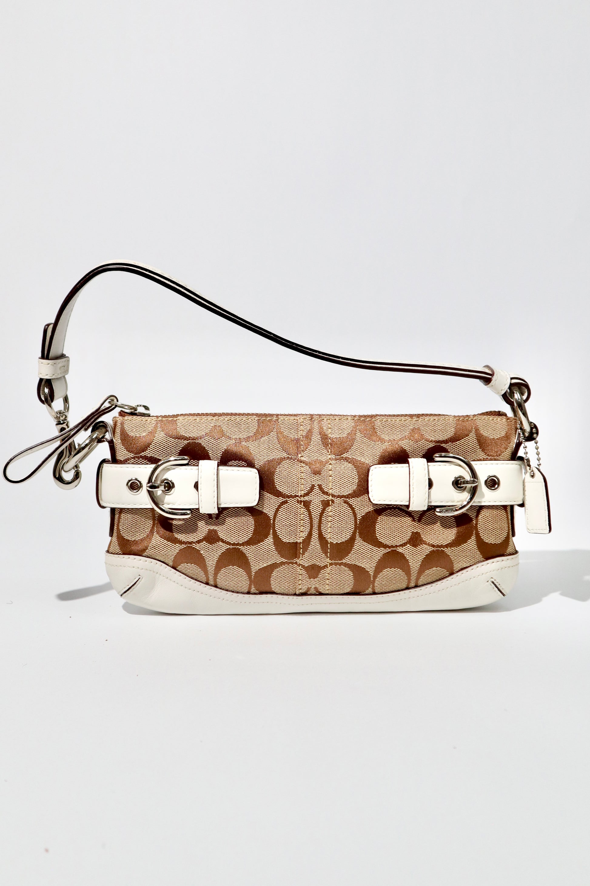 Vintage Coach 2005 Mini Belt Shoulder Bag in Tan & Brown on a white background