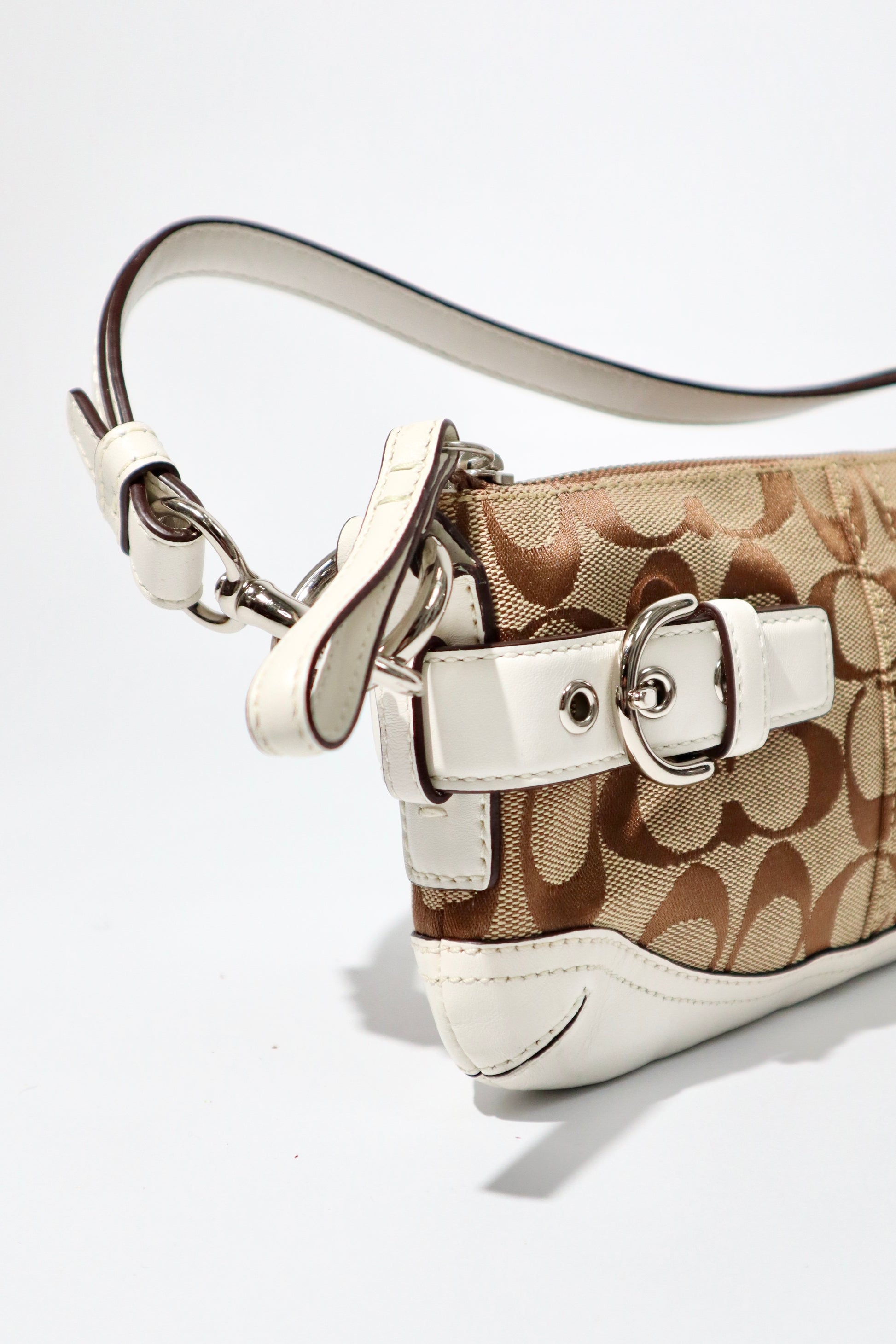 Vintage Coach 2005 Mini Belt Shoulder Bag in Tan & Brown featuring a stylish design and durable materials.