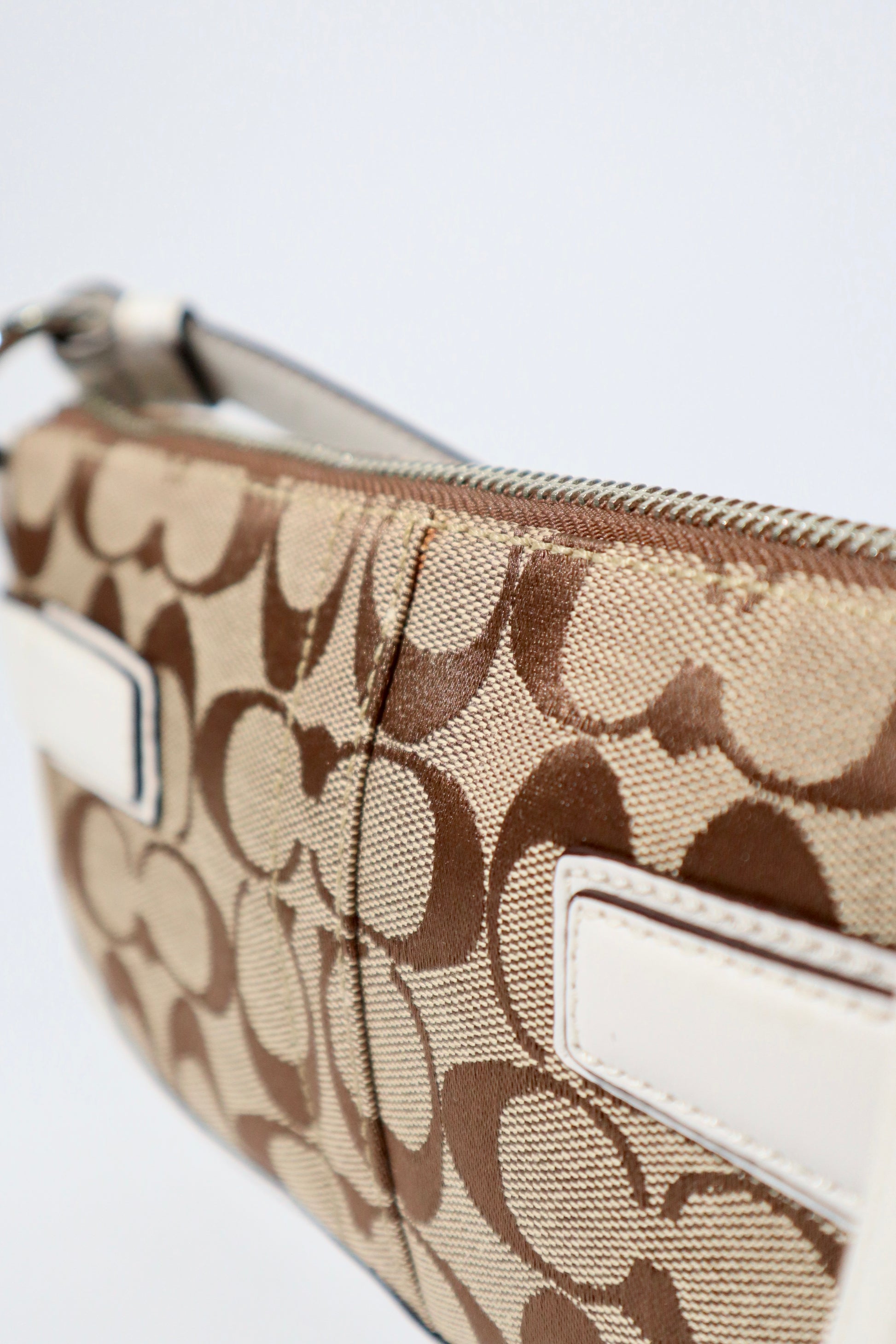 Vintage Coach 2005 Mini Belt Shoulder Bag in Tan & Brown close-up of fabric and details.