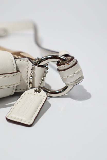 Vintage Coach 2005 Mini Belt Shoulder Bag in Tan & Brown close-up of hardware and tag detail
