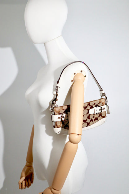 Vintage Coach 2005 Mini Belt Shoulder Bag in Tan & Brown displayed on a mannequin against a minimalist background.