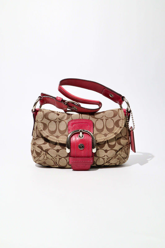 Vintage Coach 2007 Signature Soho Belt Shoulder Bag in Pink shown from the front featuring buckle belt