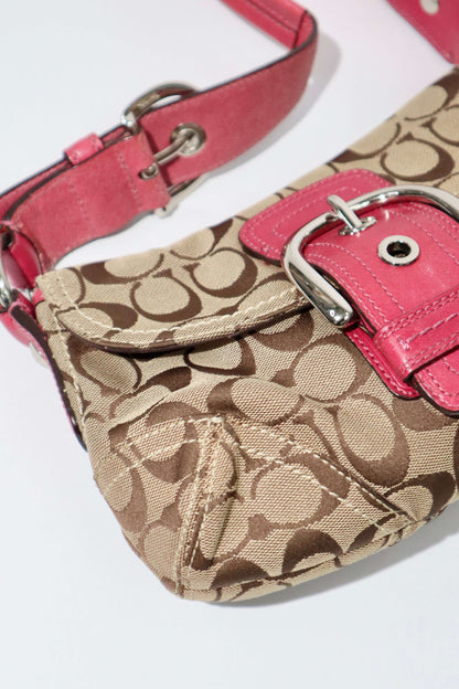 Vintage Coach 2007 Signature Soho Belt Shoulder Bag in Pink showing the exterior corner 