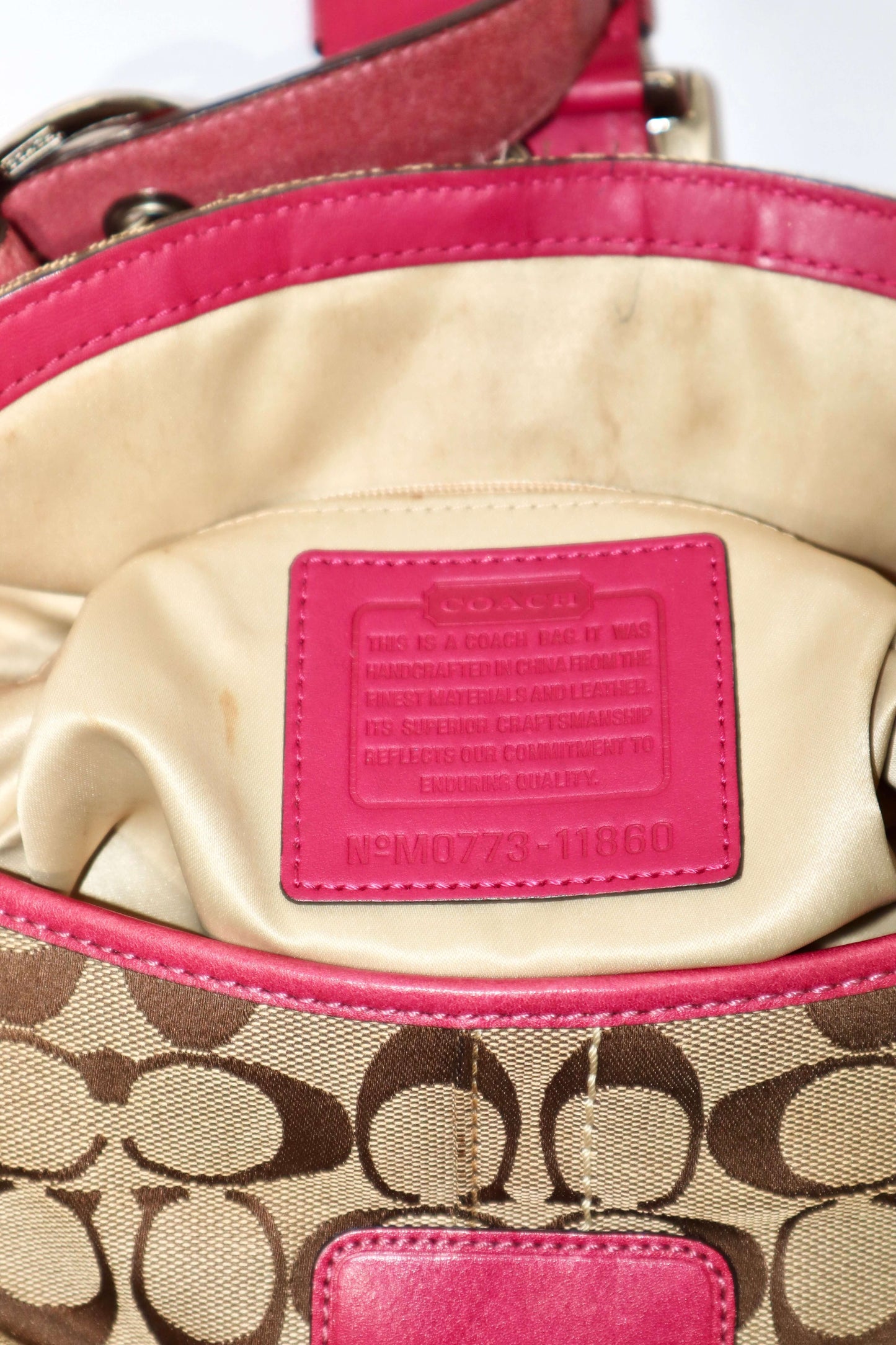 Vintage Coach 2007 Signature Soho Belt Shoulder Bag in Pink showcasing the serial number