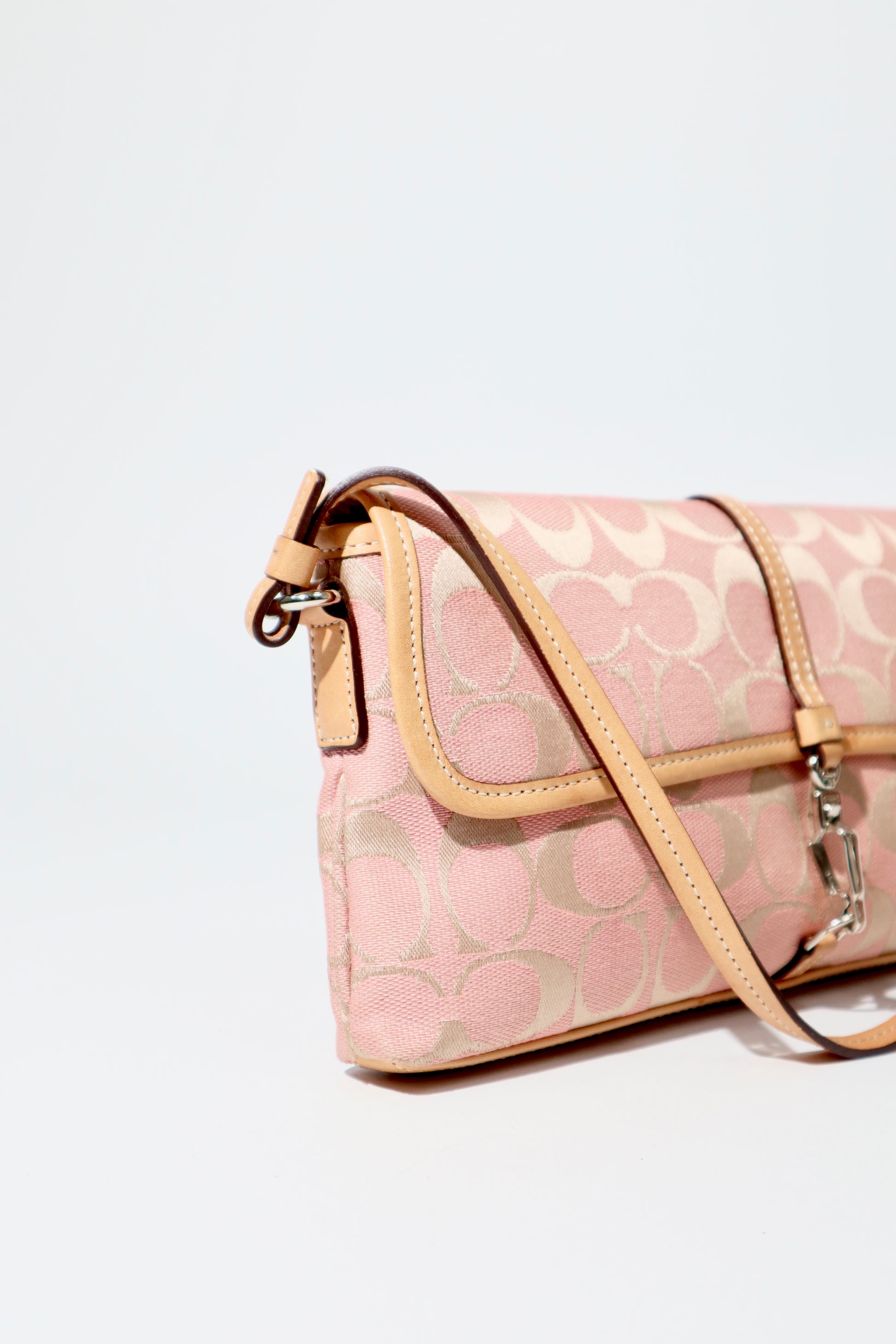 Vintage Coach 2002 Hampton Clip Demi Shoulder Bag in Peach side view 