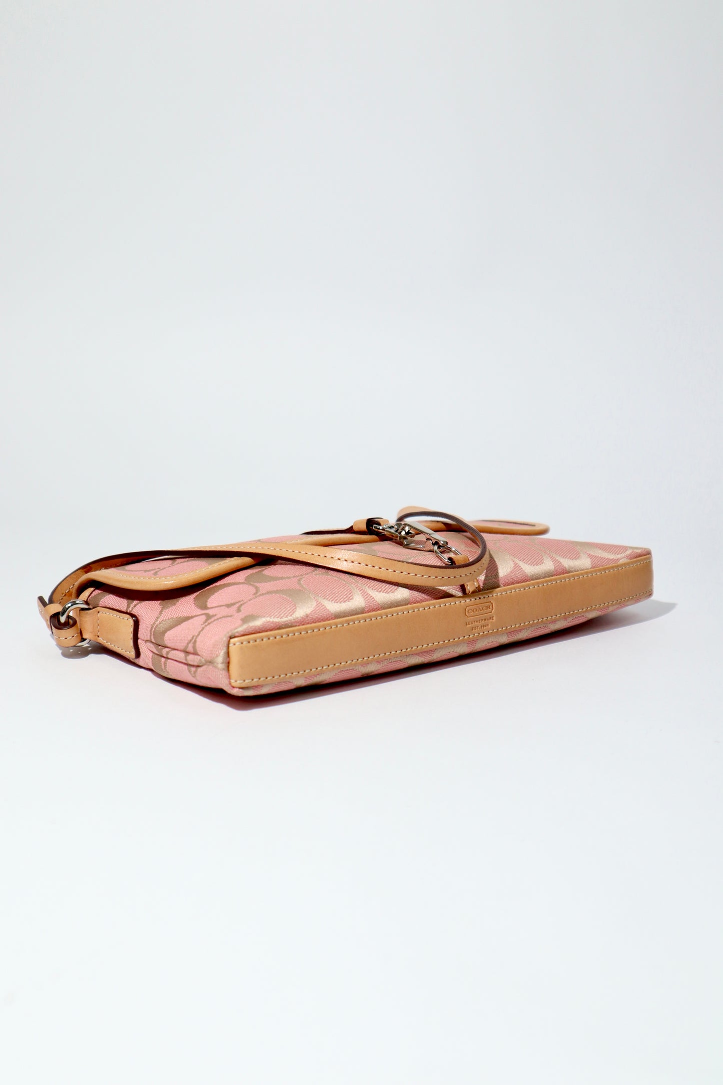 Vintage Coach 2002 Hampton Clip Demi Shoulder Bag in Peach bottom view 