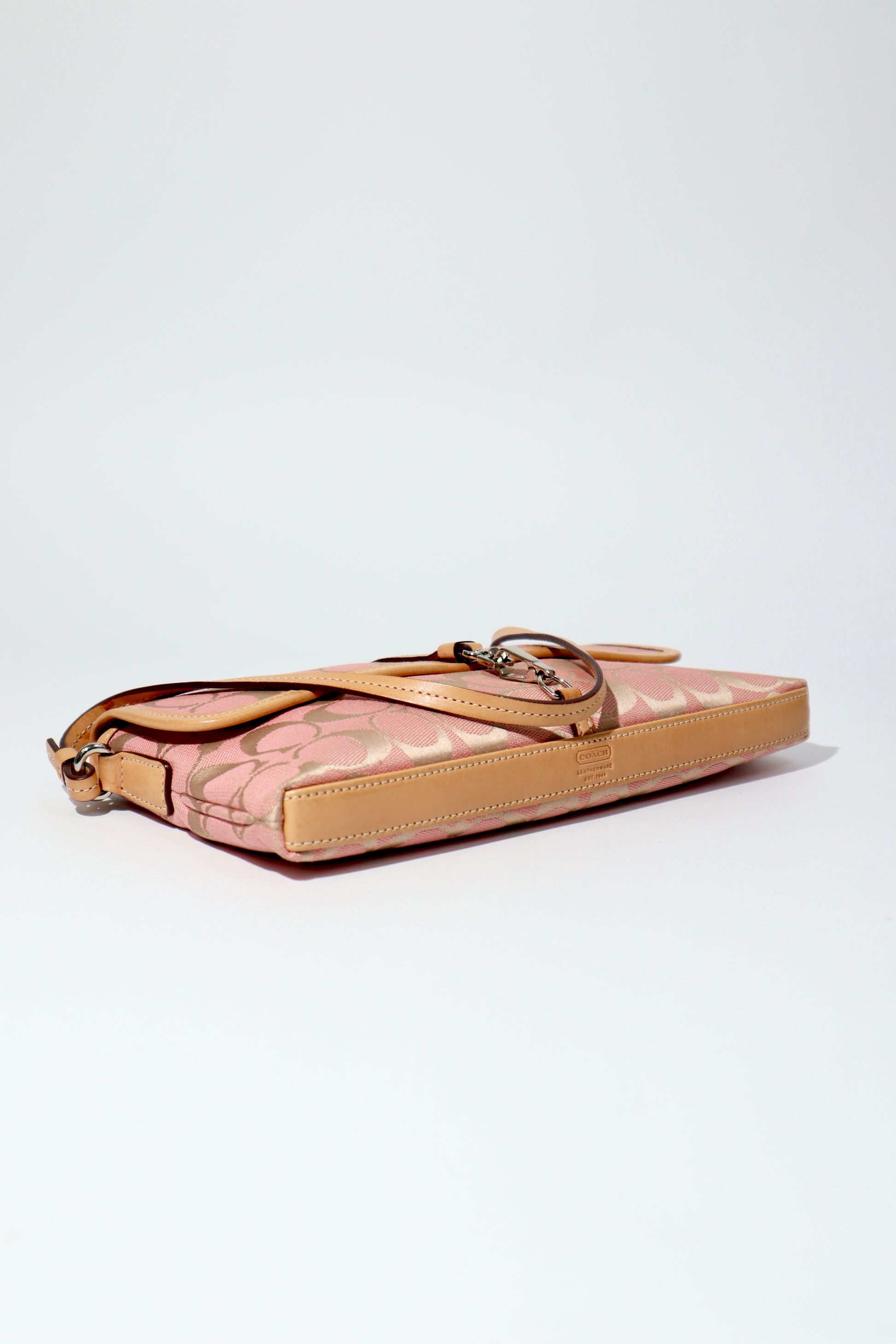 Vintage Coach 2002 Hampton Clip Demi Shoulder Bag in Peach bottom view 