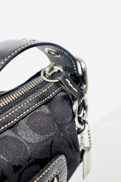 Vintage Coach 2004 Black Canvas Bucket Shoulder Bag close up of zipper 