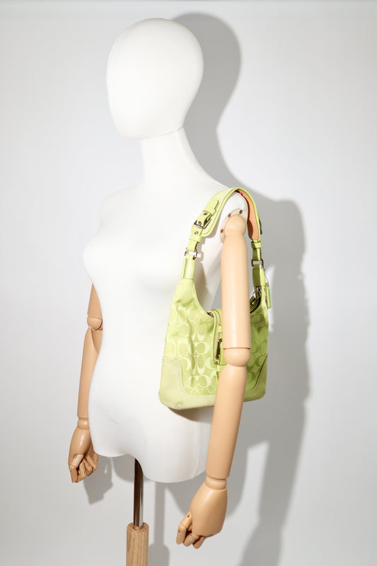 Vintage Coach 2004 Lime Green Hobo Shoulder Bag worn on mannequin 